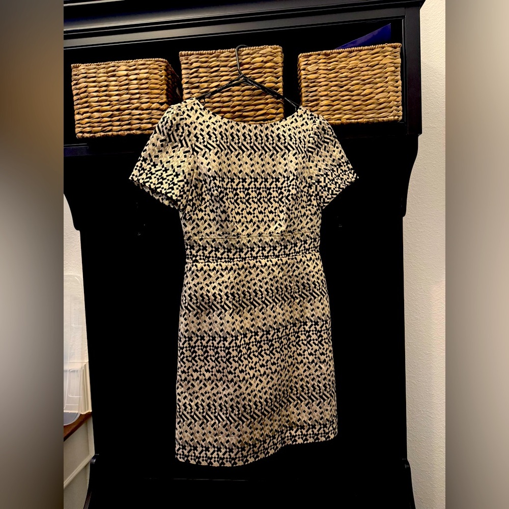 Gold and black classy cocktail dress.